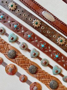 Vintage Concho Belt Leather vegan suede heart star Silver turquoise skinny SCROLL DOWN 4 Info ....CHOOSE ONE (of 6)  1. Tony Lama Scrolled Silver Buckle stay tip, Brown woven edges, Silver floral scrolled ovals, 35x 1 1/4", 5 holes: 28-31", $68   2. Silver Buckle/stay, Brown cowhide Hip Belt, Silver&green flowers, rivets, 47.5x 1 3/8", 10 holes: 35.5- 43.5", $72  3. Brushed silver Buckle/leather stay, India, wide Brown Leather Hip Belt, studs rivets, Turquoise spots, 45.5x 1 3/8", 5 holes: 35-42 Upcycled Leather, Brown Cowhide, Concho Belt, Hip Belt, Tony Lama, Suede Belt, Western Belts, Western Leather, Western Jewelry