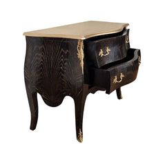 an ornate black and gold side table with two drawers on each side, one drawer open