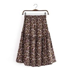 Product Details: We see this skirt in your future Floral print Loose fit Lace-up decor Material: Cotton, rayon Patterned Skirt For Spring Vacation, Patterned Skirt For Vacation In Spring, Spring Patterned Printed Skirt, Non-stretch Multicolor Floral Print Skirt, Spring Brown Gathered Skirt, Spring Patterned Lined Skirt, Flowy Floral Print Rayon Skirt, Patterned Floral Print Long Skirt, Patterned Long Skirt With Floral Print