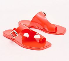 These modern jelly sandals elevate the popular childhood style with cutout details and an added buckle. Wear them poolside with a flowy caftan or with a slim ankle pant and striped sweater. From Vince Camuto. Casual Flat Jelly Sandals For Summer, Summer Vacation Jelly Sandals With Buckle Closure, Flat Jelly Sandals For Spring Beach Outings, Flat Jelly Sandals For Spring Beach, Spring Beach Flat Jelly Sandals, Chic Jelly Sandals For Summer Vacation, Trendy Jelly Sandals For Summer Beach, Trendy Jelly Sandals For Vacation, Trendy Summer Jelly Sandals For Beach