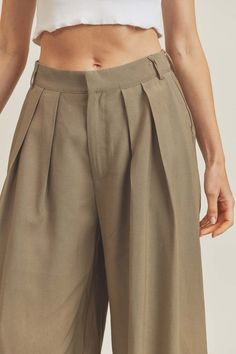 Our Nola Wide Leg Trousers are on point for any season! Featuring a pleated front, high waist and pockets. This Trouser has a perfect Linen feel. Great item to extend your wardrobe. Wide Leg Pleated Trousers, Fits Clothes, Pleated Trousers, American Express, Wide Leg Trousers, Fall Season, Timeless Pieces, The Fall, Apparel Accessories