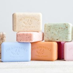 five soap bars stacked on top of each other in front of a white background with the words preceprovinance written on them