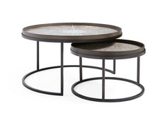 two tables with metal bases and glass tops