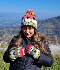 Hand knitted wool sheep booble hat and wrist warmers matching set patterned by Meriva for women, Sheeps are pacing the countryside at sunset. ✔️QUALİTY :All of my styles are made of wool yarn that will keep you warm and comfortable during the cold winter months also fleece lined, and non-itchy. ✔️SIZE :  BEANIE SIZES: Avaible for  S/M/L/XL sizes. Measure your head as shown in the listing  photo then decide your sizes.  WRIST WARMER SIZE (ONE SIZE fits most) They  have 7,87 inches 20 cm circumfer Whimsical Knitted Winter Beanie, Whimsical Winter Knitted Beanie, Whimsical Beanie For Winter, Novelty Winter Crochet Hat, Playful Hand Knitted Winter Hat, Whimsical One-size Beanie For Winter, Cozy Multicolor Beanie For Outdoor, Warm Multicolor Beanie For Winter, Warm Multicolor Winter Beanie