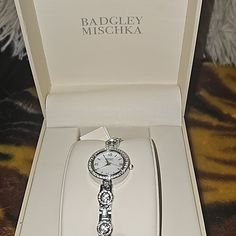 Badgley Mischka Crystal Watch Beautiful Dainty Waterproof Stainless Steel * Never Worn* Comes With Box Elegant Stainless Steel Watches With Diamond Accents, Elegant Silver Watches With Rhinestones, Luxury Crystal Watches For Formal Occasions, Elegant Crystal Watch With Rhinestones, Rectangle Face, Crystal Watch, Rose Gold Watches Women, Jewel Badgley Mischka, Crystal Watches