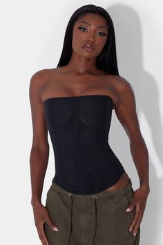 Meet our Muse Mesh Corset Top - a modern sleek black corset top with simple flattering vertical wire boning. Featuring a double layered mesh material making it slightly sheer, strapless strap top and rounded hemline. Our Muse Top provides high support to life your bust and shape your waist. Slip it on with ease by unzipping the invisible back zipper. Elegant Nylon Corset With Built-in Bra, Stretch Corset Dress With Built-in Bra, Sleeveless Mesh Corset Dress, Sheer Sleeveless Mesh Corset Dress, Sheer Mesh Sleeveless Corset Dress, Strapless Mesh Corset With Boned Bodice, Stretch Corset With Boned Bodice, Elegant Sleeveless Mesh Corset Dress, Sleeveless Mesh Corset Dress For Summer