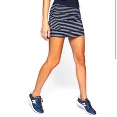 Nwot Perfect Condition Size Medium Athleta Ruffle Skirt With Built In Shorts And Pockets Navy And White Strip Extremely High Quality Material And Functional Fit Make An Offer! Athleta Shorts, Shorts Skirt, Athletic Skort, Tennis Skort, Golf Skort, Black Activewear, Pleated Mini Skirt, Tennis Skirt, Skorts