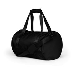 a black duffel bag sitting on top of a white floor