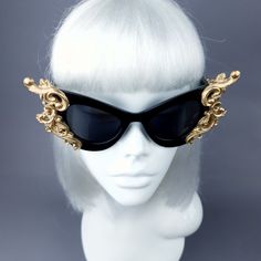 Hand-decorated black & gold filigree ornate sunglasses. Decorated with hand moulded filigree & roses. These can be made in silver filigree and white or black sunglasses if you ask. Please note: There is no readymade sunglasses box large enough for these sunglasses. These sunglasses are wearable art and need to be treated with due care. While i have taken every possible care to make them sturdy throwing them in a bag careless may damage them. Treat them as you would a precious thing... Ha Luxury Gold Cat Eye Sunglasses For Party, Elegant Gold Cat Eye Sunglasses For Evening, Elegant Gold Cat Eye Sunglasses, Gold Party Sunglasses, Vintage Black Sunglasses For Parties, Gothic Black Sunglasses For Party, Black Gothic Sunglasses For Party, Sunglasses Decorated, Gothic Couture