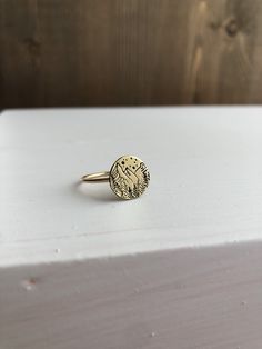 "This ring displays a beautiful mountain scene stamped on a dainty circle. This unique mountain ring comes packaged in a hand-stamped box upon request and is the perfect gift for naturalists. It is available in jeweler's brass or sterling silver. For me this ring invites a rush of the happiest feelings; the breeze coming through your tent in the morning, the beautiful prints you found while hiking, the smell of fire, the sound of the birds, the sway of the trees while you watch the stars. This s Etched Brass Rings As Gifts, Etched Brass Rings For Gifts, Nature-inspired Engraved Ring As A Gift, Nature-inspired Engraved Round Ring For Gift, Nature-inspired Engraved Ring For Gifts, Nature-inspired Brass Rings For Gifts, Watch The Stars, Mountain Ring, Bee Ring