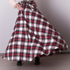 White plaid skirt: - Side seam pockets - Hidden zipper in the side seam - Separate sash - Classic tartan pattern - Fabric is 40% wool, 58% polyviscose, 2% of elastane Model is 6'2'', she wears US 8 size US 0  Bust 82 cm (32.5 inches) Waist 64 cm (25 inches) Hips 89 cm (35 inches) US 2  Bust 85 cm (33.5 inches) Waist 66 cm (26 inches) Hips 92 cm (36 inches) US 4  Bust 88 cm (34.5 inches) Waist 68 cm (27 inches) Hips 94 cm (37 inches)  US 6  Bust 90 cm (35.5 inches) Waist 71 cm (28 inches) Hips 96 cm (38 inches)  US 8  Bust 93 cm (36.5 inches) Waist 74 cm (29 inches) Hips 99 cm (39 inches) US 10  Bust 95 cm (37.5 inches) Waist 76 cm (30 inches) Hips 102 cm (40 inches) US 12  Bust 99 cm (39 inches) Waist 80 cm (31.5 inches) Hips 105 cm (41.5 inches) US 14  Bust 103 cm (40.5 inches) Waist 84 c White Flared Skirt For Winter, White Cotton Winter Skirt, Scottish Plaid Skirt For Winter, White Full Skirt For Fall, Winter Scottish Plaid Skirt, Winter Cotton Plaid Skirt, Winter Plaid Cotton Skirt, Plaid Cotton Flared Skirt, Cotton Plaid Flared Skirt