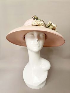 Classic vintage hat. Perfect for Ascot, weddings, special occasions, very elegant. Comes with elastic to hold hat in place. Condition: vintage perfect Colour: pale pink Label: Made in England Material: polyester Size: M inner circumference aprox. 21.5-22 inches, circumference 44"" *Please note all hats come securely packed in a box *All our vintage items come in clean and best condition possible *Please note all hats come securely packed in a box *All our vintage items are top quality authentic Beige Flat Brim Boater Hat For Formal Occasions, Curved Brim Top Hat For Royal Ascot, Formal Flat Brim Hat For Royal Ascot, Formal Boater Hat With Flat Brim For Spring, Formal Spring Boater Hat With Flat Brim, Formal Spring Hat With Flat Brim, Elegant Cream Hat Bands For Formal Occasions, Beige Cloche Hat For Church, Formal Flat Brim Hat For Spring