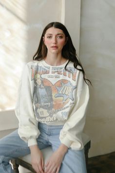 Our 'Tom Petty and the Heartbreakers 1979 Sweatshirt' marries classic rock vibes with a commitment to ethical fashion. Crafted from pure organic cotton, its soft vintage cream shade—courtesy of gentle, low-impact dyes—pays homage to an era of timeless tunes and forward-thinking environmental care. A must-have for anyone who loves their music with a side of eco-consciousness, this sweatshirt radiates a luxe yet responsible charm. Machine Wash Cold / Warm Tumble dry on low To maintain the quality Oversized Retro Sweatshirt, Vintage Ribbed Cuffs Top For Spring, Vintage Tops With Ribbed Cuffs For Spring, Vintage Letter Print Sweatshirt For Spring, Retro Oversized Sweatshirt For Spring, Oversized Retro Sweatshirt For Spring, Vintage Style Oversized Sweatshirt, White Vintage Sweatshirt With Relaxed Fit, White Vintage Sweatshirt Relaxed Fit