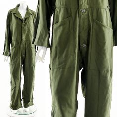 "-Green Airforce Jumpsuit Label: Dallas Uniform Corporations Tag Size: Medium Fits like: M - L Material: Cotton Condition: Excellent Clipped on Mannequin: No ✂ SIZE + FIT ✂ Length: 63\" / 160 cm Shoulders, seam to seam: 19\" / 48 cm Sleeve Length: 24\" / 61 cm Bust: 46\" / 117 cm Waist: 36\" / 91 cm Hips: 44\" / 112 cm Inseam: 30\" / 76 cm All measurements are taken with garment lying flat. ALWAYS refer to measurements as vintage sizes run can vary greatly from today's modern sizes. We recommend Military Jumpsuit, 90s Jumpsuit, Jumpsuit Vintage, Sheer Jumpsuit, Mens Overalls, Dress Form Mannequin, Vintage Jumpsuit, Suit Jumpsuit, Vintage Jumper