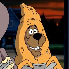 a cartoon character in a yellow dog costume with his head turned to look like he's smiling