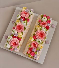 two slices of cake decorated with flowers on a plate