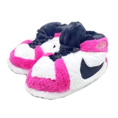 a pair of shoes with pink and white fur