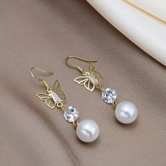 This Unique Pair Is A Wonderful Addition To Your Wardrobe And Your Style; Sure To Get Lots Of Compliments! Gsumd8002000wa3 White Crystal Metal Earrings For Formal Events, White Metal Crystal Earrings For Formal Occasions, White Metal Crystal Earrings For Party, White Pearl Earrings With Rhinestones For Party, Party White Crystal Metal Earrings, Cotton Dress Indian, Teacup Cats, Skull Fire, Boho Drop Earrings