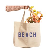 Our stylish Beach Canvas Tote is the perfect bag to pack for a seaside escape. It's a fashionable way to carry your essentials while keeping it breezy and beachy - no matter where you go! Sand-colored Shoulder Bag For Summer Travel, Large Capacity Canvas Bucket Bag For Vacation, Large Capacity Canvas Bag For Spring Beach Outings, Trendy Canvas Shoulder Bag For The Beach, Large Capacity Casual Canvas Beach Bag, Sand-colored Travel Bags For Beach Season, Spring Vacation Beige Canvas Bag, Large Capacity Canvas Shoulder Bag For Beach Season, Casual Large Capacity Canvas Beach Bag