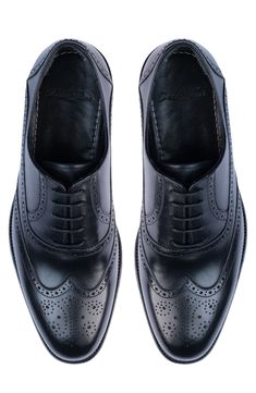 Handmade of smooth leather, this wingtip toe dress shoe with a classic oxford silhouette offers a sophisticated, elegant look. Leather upper and lining/synthetic sole Made in Turkey Classic Slippers, Wingtip Shoes, Wingtip Oxford, Flip Flop Slippers, Ugg Classic, Dress Shoe, Denim Branding, Mens Oxfords, Sweaters And Leggings