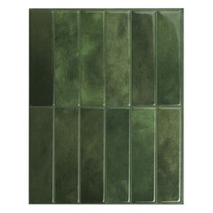 green glass tiles are arranged in rows on a white background, with the same color as the tile