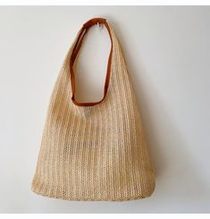 Lightweight straw woven tote bag perfect for all occasions. Size approximately 34cm wide x 25cm tall (13in x 10in) Designer Style ID: 8303 Beach Hobo Bag With Braided Handles, Beige Hobo Bag With Braided Handles For Beach Season, Beige Straw Hobo Bag With Adjustable Strap, Natural Straw Hobo Bag With Adjustable Strap, Beige Straw Satchel Bag, Large Capacity Straw Shoulder Bag In Beige, Beige Large Capacity Straw Shoulder Bag, Natural Color Satchel Hobo Bag For Summer, Large Capacity Beige Straw Shoulder Bag