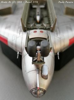 a model airplane is shown with the cockpit open and it's wheels still in place