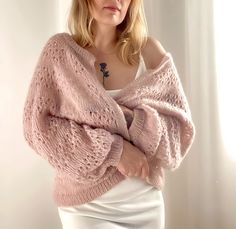 Add a touch of elegance and sophistication to your bridal ensemble with our Pink Mohair Jacket. This versatile piece can be worn in multiple ways - as a Women's Bridal Wrap, Wedding Cardigan, Mohair Cape, or Bridal Cover up. Made with high-quality mohair and wool, this Pink Cardigan is perfect for adding a pop of color to your outfit while keeping you warm and stylish on your special day. Whether you're looking for a Pink Wool Jacket for a wedding or a chic layering piece for a cool evening, thi Elegant Cream Cardigan For Wedding, Elegant Fitted Cardigan For Weddings, Elegant Winter Wedding Cardigan, Elegant Fitted Mohair Cardigan, Mohair Jacket, Pink Wool Jacket, Wedding Cardigan, Mohair Coat, Bridal Cover Up