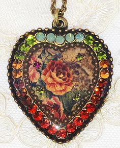 Michal Negrin heart necklace. With a Roses pattern and earth tones Swarovski crystals. The heart measures 1 1/4 inch high and 1.1 inch wide. New in a gift box. For rare Michal Negrin items that can only be found in my eBay store, please visit AC Designer Outlet Combined shipping is only $5 for each additional item. Vintage Multicolor Jewelry For Valentine's Day, Heart-shaped Rose Design Necklace For Valentine's Day, Vintage Rose Design Necklaces For Valentine's Day, Autumn Roses, Michal Negrin, Autumn Rose, Roses Pattern, Rosé Heart, Pearl Pendant Necklace