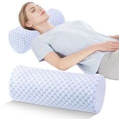 a woman laying on top of an inflatable pillow