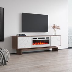 an entertainment center with a fireplace in the middle and a flat screen tv above it