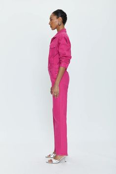 Make a statement in our Nikki Jumpsuit- Pink Garnet. This one-piece style looks just like two and comes in a bright pink hue for a show-stopping look. Enjoy no-stress styling: pair with a belt or wear alone. This jumpsuit also features a snap front closure with zippered fly for an extra element of style. Dress it up or down for any special event. Experience effortless elegance with Nikki! 72% Cotton, 27% Ploly, 1% Spandex Wash Cold Pink Fitted Jumpsuit For Work, Fitted Pink Jumpsuits And Rompers For Work, Fitted Pink Jumpsuits For Work, Jumpsuit Pink, Pink Garnet, Best Swimwear, Event Experience, Pink Jumpsuit, Knit Jumpsuit