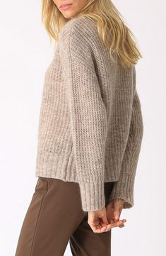 Cozy yarns warmed with plush mohair and fine wool soften the rich, ribbed texture of this sweater knit with a boxy fit that layers easily over your casual weekend look. Crewneck Long sleeves with ribbed cuffs 34% nylon, 31% mohair, 31% wool, 4% Lycra® spandex Dry clean Imported Boxy Sweater, Casual Weekend, Fashion 2024, Ribbed Texture, Nordstrom Store, Sweater Knit, Oatmeal, Knitted Sweaters, Top Brands