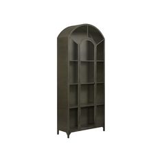 a tall bookcase with an arched door and shelves on the front, in dark green