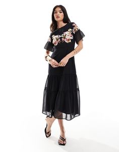 Dresses by Hope & Ivy Occasions made easy High neck Floral embroidery Flutter sleeves Fitted waist Tiered skirt Cut-out back Back zip closure Regular fit Chic Floral Embroidered Maxi Dress, Chic Floral Embroidered Midi Maxi Dress, Embroidered Maxi Dress For Summer Evening, Chic Embroidered Evening Maxi Dress, Flowy Midi Maxi Dress With Floral Embroidery, Elegant Embroidered Short Sleeve Maxi Dress, Elegant Short Sleeve Embroidered Maxi Dress, Flowy Floral Embroidered Midi Maxi Dress, Flowy Floral Embroidered Maxi Dress