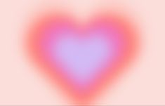 a heart shaped object on a pink and white background with blurry light in the middle