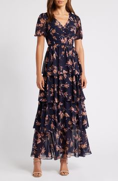 Romantic blooms complement the billowy tiers of this party-ready dress designed with short, subtle puff sleeves. Hidden side-zip closure V-neck Short sleeves Lined 100% polyester Machine wash, dry flat Imported Nordstrom Dresses, Chiffon Dress, Puff Sleeves, Side Zip, Floral Dress, Tulips, Puff Sleeve, Designer Dresses, Chiffon