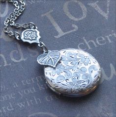 A personal favorite from my Etsy shop https://www.etsy.com/listing/495394557/silver-locket-necklace-flower-jewelry Charming Silver Necklace For Wedding, Charming Heart-shaped Wedding Jewelry, Charming Adjustable Jewelry For Wedding, Adjustable Vintage Charm Jewelry For Wedding, Adjustable Vintage Charm Wedding Jewelry, Heart-shaped Jewelry With Flower Charm For Wedding, Heart-shaped Wedding Jewelry With Flower Charm, Charming Wedding Jewelry With Flower Charm, Flower Shaped Locket Necklaces For Weddings