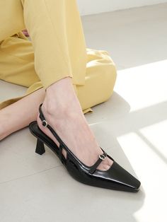 Editor's NotesAtt. is a contemporary shoe brand that stands out with its modern design and unique color sense.- Slim square shaped toe- Delicate round buckle strap detail on the instep- Elegant styled slingback pumps- Stable heel of the structural line- Comfortable fit with insole latex cushioningMeasurements(in.)- Size: KR 225MM (US 6.5) - KR 255MM (US 8.5)- Heel Height: 2.36 in.Composition & Care- Upper: Cow Leather, Lining: Pigskin, Insole: Cow Leather, Outsole: Rubber Sole- Avoid direct heat and moisture- Professional cleaning is neededDesigner- by blanc sur blanc Contemporary Shoe, Pig Skin, Slingback Pump, Men Shoes Size, Black Pumps, Pump Shoes, Unique Colors, Shoe Brands, Cow Leather