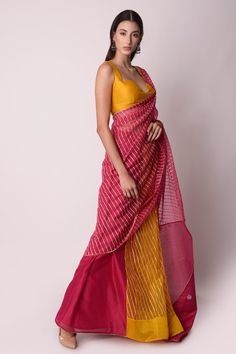 Fuschia, mustard pre-stitched saree with gota patti stripes and sequin work on the pallu. Comes with mustard blouse.
Components:2
Pattern:Embroidery
Type of Work:Gota Patti and Sequin
Neckline:Sweetheart
Sleeve Length:Sleeveless
Fabric:Organza and Chanderi
Color:Yellow
Other Details:
Low back with tie up and tassels
Lace trim at the border
Closure: Hook back
Occasion:Destination Wedding - Aza Fashions Fitted Yellow Pre-draped Saree With Dori Work, Yellow Cotton Silk Blouse With Traditional Drape, Yellow Sleeveless Blouse Piece With Pallu, Yellow Sleeveless Blouse With Pallu, Sleeveless Yellow Blouse Piece For Festivals, Yellow Cotton Silk Pre-draped Saree With Unstitched Blouse, Yellow Fitted Pre-draped Saree With Cutdana, Festive Yellow Cotton Silk Choli, Yellow Blouse Piece With Dori Work