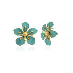 The magnolia flower meaning is attached with the symbols of nobility, perseverance, and love of nature. Soft and subtle in color yet strong in appearance, the flower is representative of the beauty encompassing femininity and gentleness. These earrings are handmade with 22K gold plated brass and enamel. These nickel free earrings are for pierced ears. They come as a pair with both butterfly and silicone earring backs. These beautiful earrings come with the Milou Jewelry box For avoiding damage to your jewels, take care that they do not contact hard chemicals. In order to prevent friction and contact origin minor damages, keep the jewels you are not using in their original package or in a protective casing. In order to keep your jewels clean, wipe them with the help of a soft fabric after u Elegant Light Blue Flower Earrings, Elegant Blue Flower Charm Earrings, Elegant Blue 3d Flower Earrings, Turquoise Flower Charm Jewelry, Blue Flower Charm Earrings, Turquoise Jewelry With Flower Charm, Turquoise Flower-shaped Earrings With Flower Charm, Light Blue Flower-shaped Jewelry With Matching Earrings, Turquoise Earrings With Flower Charm