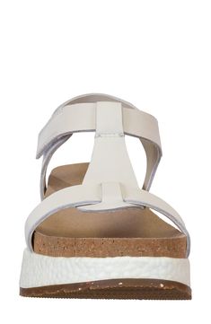 A cushioned T-strap sandal offers all-day comfort with a contoured cork footbed, Step Lite spring-back midsole and a grippy platform sole. Flat sole   1 3/4" platform   Leather or genuine calf hair (China) upper/synthetic lining/recycled rubber sole   Imported Summer T-strap Footbed Sandals With Cork-bed Midsoles, White Cork Open Toe Sandals, White Cork Sandals For Summer, White Cork Sandals For Spring, Casual T-strap Footbed Sandals With Cushioned Footbed, Modern Adjustable Cushioned Footbed Sandals, Summer Cork Footbed Sandals With Ortholite Insole, White Cork Sandals With Round Toe, Casual T-strap Footbed Sandals With Removable Insole