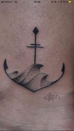 an anchor tattoo on the chest