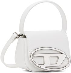 Buffed leather top handle bag in white. · Carry handle · Adjustable and detachable crossbody strap · Enameled logo hardware at face · Magnetic press-stud flap · Logo-woven twill lining · H3.5 x W4.75 x D2.5 · Total height: H6.75 Supplier color: White White Top Handle Shoulder Bag With Logo Hardware, White Shoulder Bag With Logo Hardware, Modern White Shoulder Bag With Logo Hardware, White Crossbody Shoulder Bag With Logo Hardware, White Bags With Double Handle And Logo Hardware, White Double Handle Shoulder Bag With Logo Hardware, Designer White Bag With Round Handle, Diesel 1dr Bag, 1dr Bag