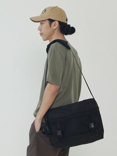 Editor's notesIt is a casual and trendy messenger bag. The bag is spacious and has buckle closure and a zip mesh pocket.- Messenger bag- Zipped mesh pocket- Spacious- Buckle closureMeasurements(in.)One Size- Width: 12.2 in.- Height: 10.6 in.- Depth: 4.3 in.*Model info: Height 5’ 11” Waist 32 in. / Fitting size: One SizeComposition & Care- 100% Polyester- Hand wash in cold waterDesigner- by ANALOGMOOD Casual Nylon Satchel With Zipper Closure, Casual Black Laptop Bag With Zipper Pocket, Casual Laptop Shoulder Bag With Zipper Pocket, Black Functional Flap Shoulder Bag, Large Capacity Casual Crossbody Briefcase, Functional Black Flap Shoulder Bag, Casual Large Capacity Crossbody Briefcase, Casual Large Capacity Shoulder Bag Briefcase, Black Nylon Casual Satchel