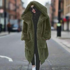 Oversized Faux Fur Hoodies Long Trench Coat Details: suitable temperature: -20-30° Type: Wide-waisted Style: Thick Warm Fur Style: Streetwear Sleeve Style: Regular Sleeve Length(cm): Full Outerwear Type: Fur & Faux Fur Model Number: chaqueta mujer Material: Faux Fur Material: Rabbit Fur Jacket Weight: 1.5-1.65kg Gender: Female Fabric content: 31% (inclusive) - 50% (inclusive) Fabric Type: Synthetic fiber Decoration: Zippers Decoration: Pockets Craft\Technics: Full Pelt Collar: With Fur Trim Hood Hooded Fluffy Parka For Cold Weather, Casual Fluffy Fur Coat For Cold Weather, Fluffy Hooded Fall Parka, Casual Fluffy Fur Coat For Fall, Hooded Fur Coat With Faux Fur Lining For Outdoor, Fluffy Hooded Cozy Outerwear, Thick Hooded Parka For Fall, Cozy Fluffy Hooded Outerwear, Cozy Solid Color Winter Outerwear