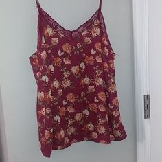 New Without Tags Size Medium Burgundy With Orange Flowers Contact Me If You Have Any Questions Bundle To Save Money Check Out My Closet Amorefinds For More Great Items In My Closet You Will Find Other Listings That Are Neon, Black Tie, Retro, Minimalist, Boho, Hippie, Casual Or Dressy, Tropical, Perfect For Vacation, Gypsy, Western, Warm Weather, Cold Weather, Classic, Neutral, Contemporary, Summertime Dopamine, Pastel, Bright, Bold, Elegant, Eclectic, Groovy, Chic, Casual, Glam, Artisan, Hand C Elegant Eclectic, Neutral Contemporary, Mum Flower, Forever 21 Activewear, Neon Black, Backless Tank Top, Top With Lace Trim, Casual Glam, Retro Minimalist