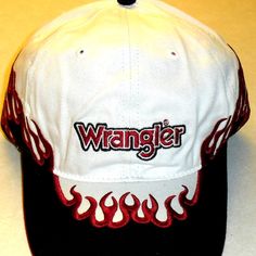 New With Tags 90s Vintage Original Wrangler Flames Style Mens Strapback Hat. The Front Has The Embroidered Wrangler Logo On It. The Bill And Sides Of The Hat Has The Embroidered Flames Design On It As Well. The Back Of The Hat Has The Sewn On Wrangler Tag On It. The Back Has The Adjustable Strapback Strap On It. Made Of Cotton Material. Vintage Rodeo Baseball Cap With Curved Brim, Vintage Curved Brim Baseball Cap For Rodeo, Casual Rodeo Hat With Curved Bill, Casual Curved Bill Hat For Rodeo, Adjustable Casual Baseball Cap For Rodeo, White Western Snapback Baseball Cap, White Western Style Snapback Baseball Cap, Casual Baseball Cap With Curved Bill For Rodeo, Western Style White Snapback Hat With Curved Brim