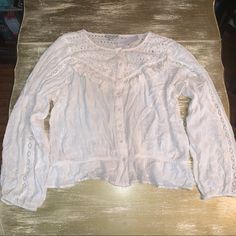 -Brand New With Tags -Size Xl -American Eagle Flowy Blouse. Has A Little Peplum Bottom. Flowy Arms With Lace Detailing. Spring Long Sleeve Peasant Top With Lace Trim, Bohemian Button-up Tops With Lace Trim, Cottagecore Spring Top With Buttons, Cottagecore Long Sleeve Tops For Spring, Long Sleeve Tops With Lace Trim For Day Out, Casual Button-up Blouse With Lace Trim, White Bohemian Button-up Top, Lace Trim Button-up Tops For Daywear, Lace Trim Button-up Top For Day Out