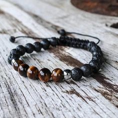 Natural Tiger's Eye Lava Rock Stone Beaded Bracelet Material: Lava Rock And Tiger's Eye Stone Size: Fits About 6.5 ~ 7.5 Inch Wrist, Adjustable Black Obsidian Bracelet, Health Bracelet, Balance Bracelet, Obsidian Bracelet, Lava Stone Bracelet, Lucky Bracelet, Tiger Eye Bracelet, Protection Bracelet, Tiger Eye Stone